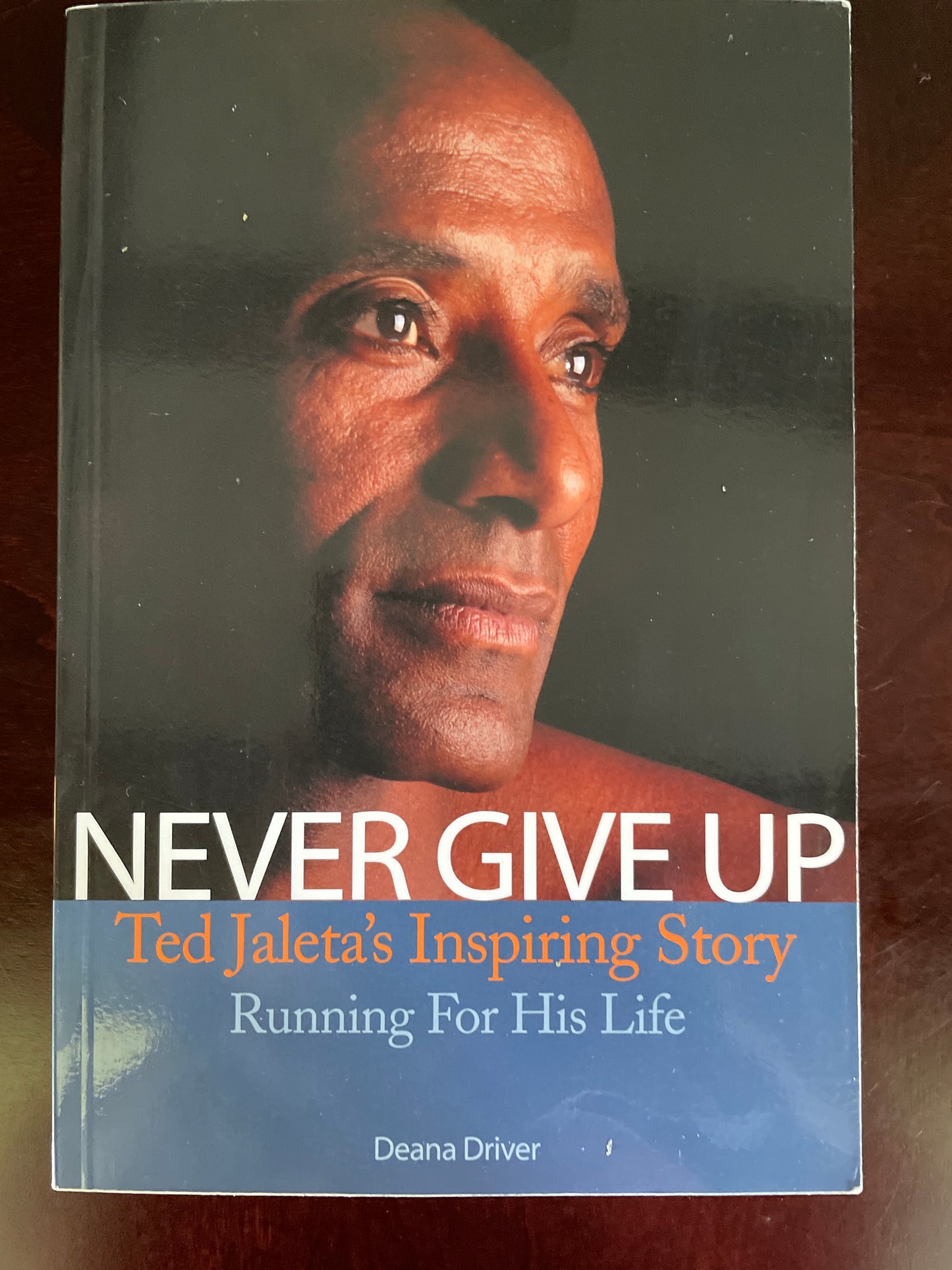 Never Give Up: Ted Jaleta's Inspiring Story (Signed) - Driver, Deana