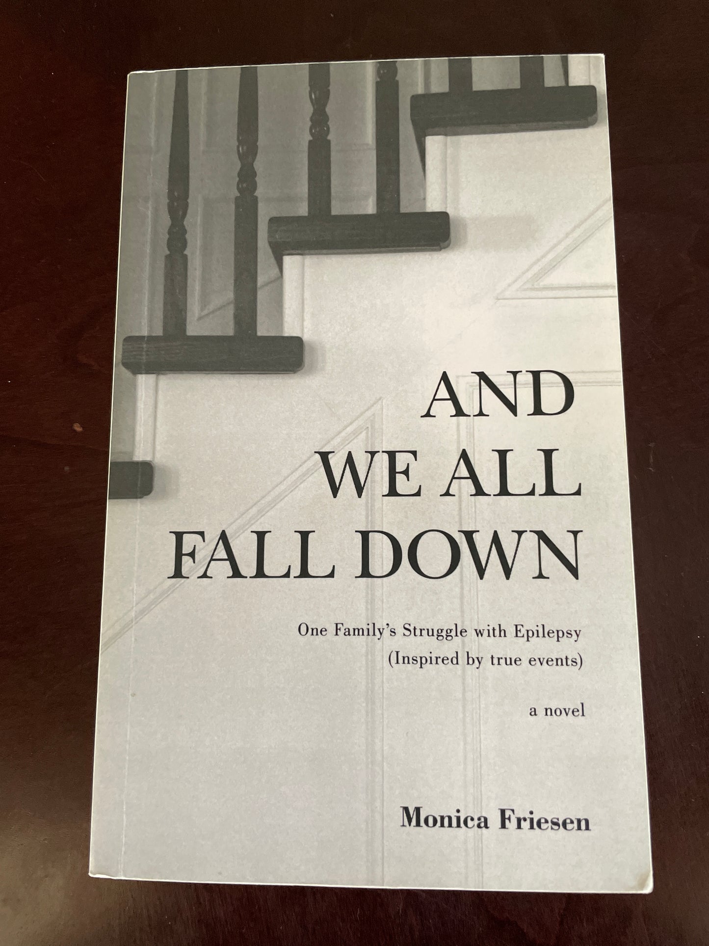 And We All Fall Down: One Family's Struggle with Epilepsy (Inspired by true events)(Inscribed) - Friesen, Monica